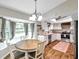 Eat-in kitchen includes a breakfast nook and is open to the updated kitchen at 316 Jenkins Ave, Brooksville, FL 34604