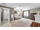 Spacious main bedroom boasts ample natural light, neutral colors, and plush carpet at 316 Jenkins Ave, Brooksville, FL 34604