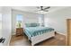Bedroom with hardwood floors and large windows at 3285 Minnow Creek Dr, Hernando Beach, FL 34607