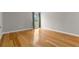 Comfortable bedroom featuring hardwood floors, neutral walls, and bright natural light at 3325 Bayshore Blvd # C36, Tampa, FL 33629