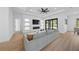 Bright living room with recessed lighting, a modern fireplace, and sliding glass doors to the patio at 3344 Lagoy St, North Port, FL 34291