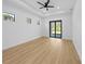 Spacious main bedroom features a sliding glass door that leads to the backyard at 3344 Lagoy St, North Port, FL 34291
