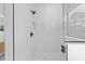 Elegant shower featuring black hardware and contrasting tile accents at 3344 Lagoy St, North Port, FL 34291