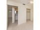 Bedroom view showcasing closet and bathroom access, offering convenience and privacy at 3404 Dahlia Pl, Largo, FL 33771