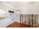Well-lit kitchen with new cabinets and appliances at 3404 Dahlia Pl, Largo, FL 33771