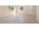 The living room has new tile flooring and fresh paint at 3404 Dahlia Pl, Largo, FL 33771