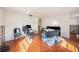 This living room with tile floors needs renovations with block walls exposed and could be updated at 3404 Dahlia Pl, Largo, FL 33771