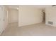 The living room has light-colored tile flooring and fresh paint at 3404 Dahlia Pl, Largo, FL 33771