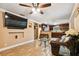 Open-concept living room seamlessly connects to the kitchen, creating a spacious and inviting atmosphere at 3414 Whittier St, Tampa, FL 33619