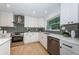 Bright kitchen showcasing modern appliances and features at 4106 W Fielder St, Tampa, FL 33611