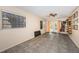 Room with tiled floor, ceiling fan and window with direct access to outside at 4106 W Fielder St, Tampa, FL 33611