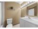 Bathroom features a white sink, vanity, and toilet at 4304 N River View Ave, Tampa, FL 33607