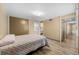 Bright bedroom featuring wood floors, a closet and neutral walls at 4304 N River View Ave, Tampa, FL 33607