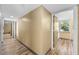 Hallway with neutral paint and contrasting trim at 4304 N River View Ave, Tampa, FL 33607