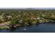 Aerial view of luxury homes on the water with docks and stunning views at 4304 N River View Ave, Tampa, FL 33607
