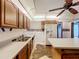 This is an expansive kitchen with lots of wood cabinets, a double sink, and a center island at 4709 Mineola St, Bradenton, FL 34207