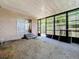 Enclosed glass patio offering both privacy and a bright, airy space at 4709 Mineola St, Bradenton, FL 34207