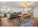 Spacious open-concept with kitchen, dining area, and natural light, creating a welcoming atmosphere at 4710 W Tambay Ave, Tampa, FL 33611
