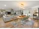Bright and airy living space featuring modern furnishings and seamless flow at 4710 W Tambay Ave, Tampa, FL 33611