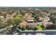 An aerial view of Magnolia Square Condominiums featuring lush green landscaping at 501 E Bay Dr # 102, Largo, FL 33770