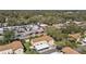 An aerial view of condos in a vibrant community near a bustling road at 501 E Bay Dr # 102, Largo, FL 33770