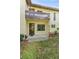 Charming condo with a private porch and well-maintained landscaping at 501 E Bay Dr # 102, Largo, FL 33770