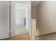 Hallway with stairs leading to the bedroom with plenty of natural light at 501 E Bay Dr # 102, Largo, FL 33770