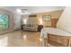 Cozy living room with hardwood floors, neutral decor, and plenty of natural light at 501 E Bay Dr # 102, Largo, FL 33770