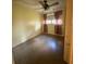 Bedroom with neutral walls, ceiling fan and natural lighting at 5279 Eureka Springs Rd, Tampa, FL 33610