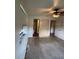 Modest bedroom with a ceiling fan and bathroom view at 5279 Eureka Springs Rd, Tampa, FL 33610