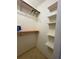 Bright closet features shelving and a hanger bar for optimal storage solutions at 5279 Eureka Springs Rd, Tampa, FL 33610