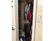 Walk-in closet full of clothing and home supplies at 5279 Eureka Springs Rd, Tampa, FL 33610