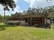 Charming single-story home with brick accents and a well-maintained front yard at 5279 Eureka Springs Rd, Tampa, FL 33610