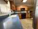 Bright kitchen with granite countertops and stainless steel appliances, perfect for cooking and entertaining at 5279 Eureka Springs Rd, Tampa, FL 33610