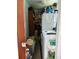 Laundry room with washer and dryer, plus plenty of storage space at 5279 Eureka Springs Rd, Tampa, FL 33610