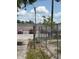 Fenced parking lot area showcasing ample parking spaces and security at 5279 Eureka Springs Rd, Tampa, FL 33610