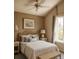 Charming bedroom with vaulted ceiling, woven headboard, soft decor and natural light at 5804 Red Cedar Ln # 5804, Tampa, FL 33625