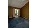 Bedroom featuring a sliding glass door to a balcony or porch, ceiling fan, and a carpet floor at 5804 Red Cedar Ln # 5804, Tampa, FL 33625