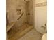 Shower with tile surround, built-in seat and grab bar, with updated shower head at 5804 Red Cedar Ln # 5804, Tampa, FL 33625