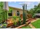 Wooden deck with hot tub surrounded by lush greenery provides a relaxing outdoor space at 7302 Sunshine Bridge Ave, Gibsonton, FL 33534
