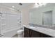 Full bathroom features shower/tub combo and vanity at 7302 Sunshine Bridge Ave, Gibsonton, FL 33534