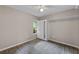 Carpeted bedroom has closet for storage at 7302 Sunshine Bridge Ave, Gibsonton, FL 33534