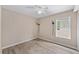 Bedroom with ceiling fan, and updated wall sconces at 7302 Sunshine Bridge Ave, Gibsonton, FL 33534