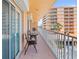 Outdoor balcony with patio seating, and water views, offers tranquil relaxation at 7432 Sunshine Skyway S Ln # 402, St Petersburg, FL 33711