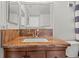 Bathroom featuring a beautiful granite counter at 7432 Sunshine Skyway S Ln # 402, St Petersburg, FL 33711