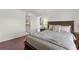 Bedroom with hardwood floors and ensuite bathroom at 7432 Sunshine Skyway S Ln # 402, St Petersburg, FL 33711