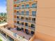 Exterior shot of a multi-story condo building showing multiple balconies at 7432 Sunshine Skyway S Ln # 402, St Petersburg, FL 33711