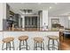 Open kitchen concept features a breakfast bar perfect for entertaining guests with ocean views at 7432 Sunshine Skyway S Ln # 402, St Petersburg, FL 33711