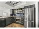 Modern kitchen features stainless steel appliances, sleek cabinets, and stylish countertops at 7432 Sunshine Skyway S Ln # 402, St Petersburg, FL 33711