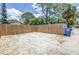Back yard featuring gravel and a tall wood fence for privacy at 750 49Th N Ave, St Petersburg, FL 33703